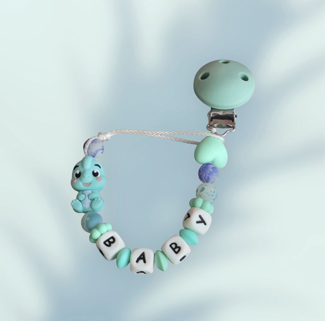 Attache tétine Petit Dino