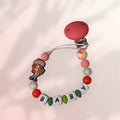 Attache tétine Charlotte au fraise