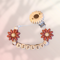 Attache-tétine Florale